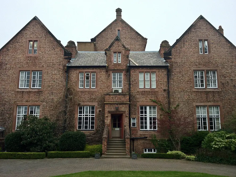 Senate House, University of Chester (Parkgate Road / Exton Park campus), Chester — symmetrical historic red-brick Gothic-revival building