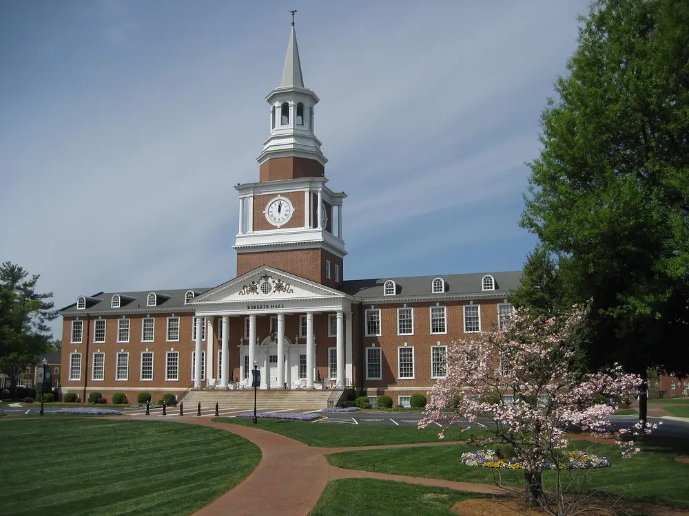 Roberts Hall, the iconic Georgian brick clock-tower building and flagship landmark of High Point University, High Point, NC — the host institution of the Workman School of Dental Medicine.