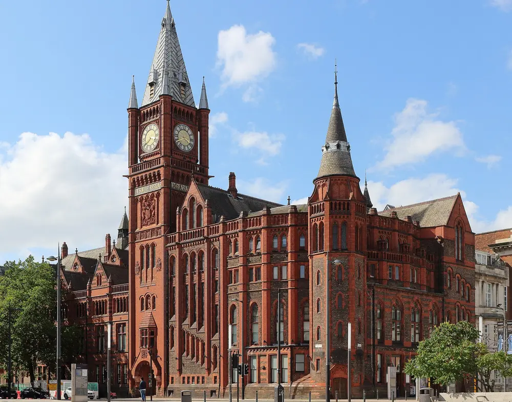The Victoria Building (red-brick clock tower), the flagship historic building of the University of Liverpool — origin of the term "redbrick university"