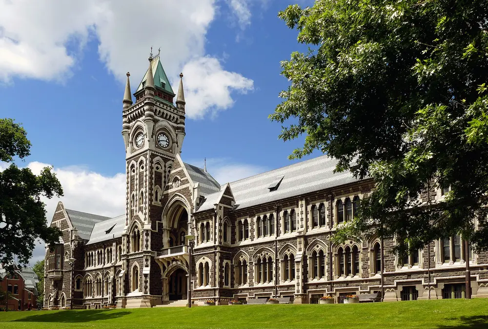 The iconic University of Otago Clocktower (Registry Building), a Gothic Revival stone landmark, Dunedin, New Zealand.